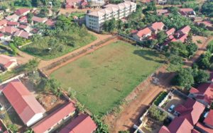 El Cambio Academy Uganda aerial view football pitch